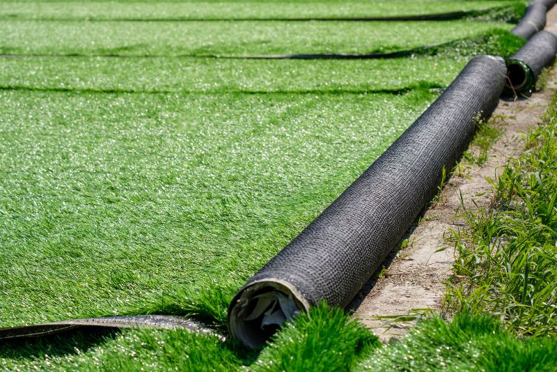 synthetic grass sheets rolled out