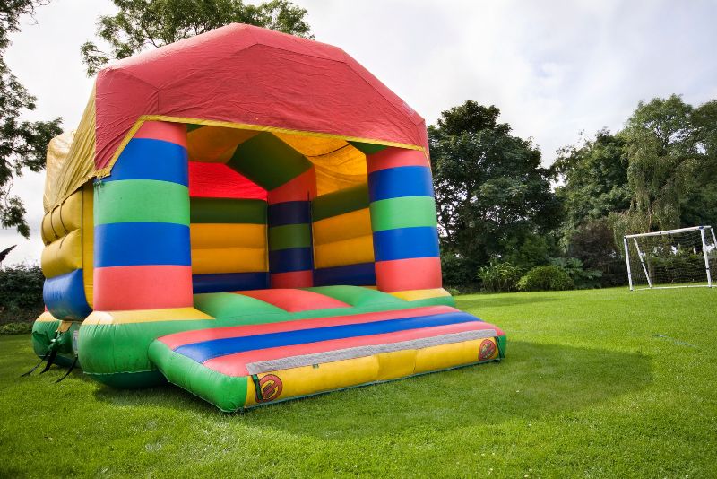 bouncing castle on an artificial lawn