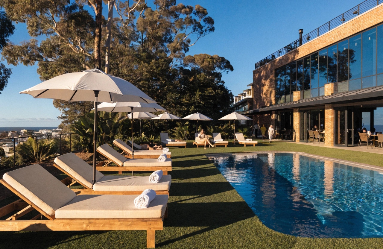 Commercial synthetic turf installed around a Central Coast hotel pool deck