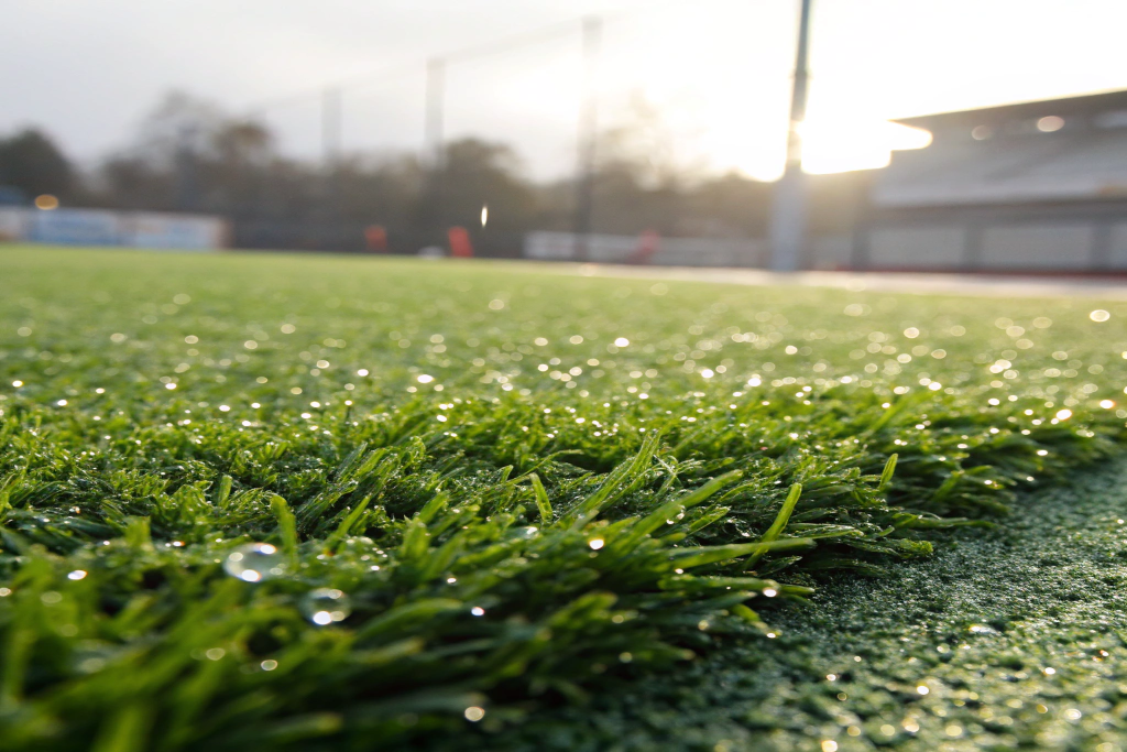 Synthetic turf surface in childcare outdoor area remaining dry and usable after rain